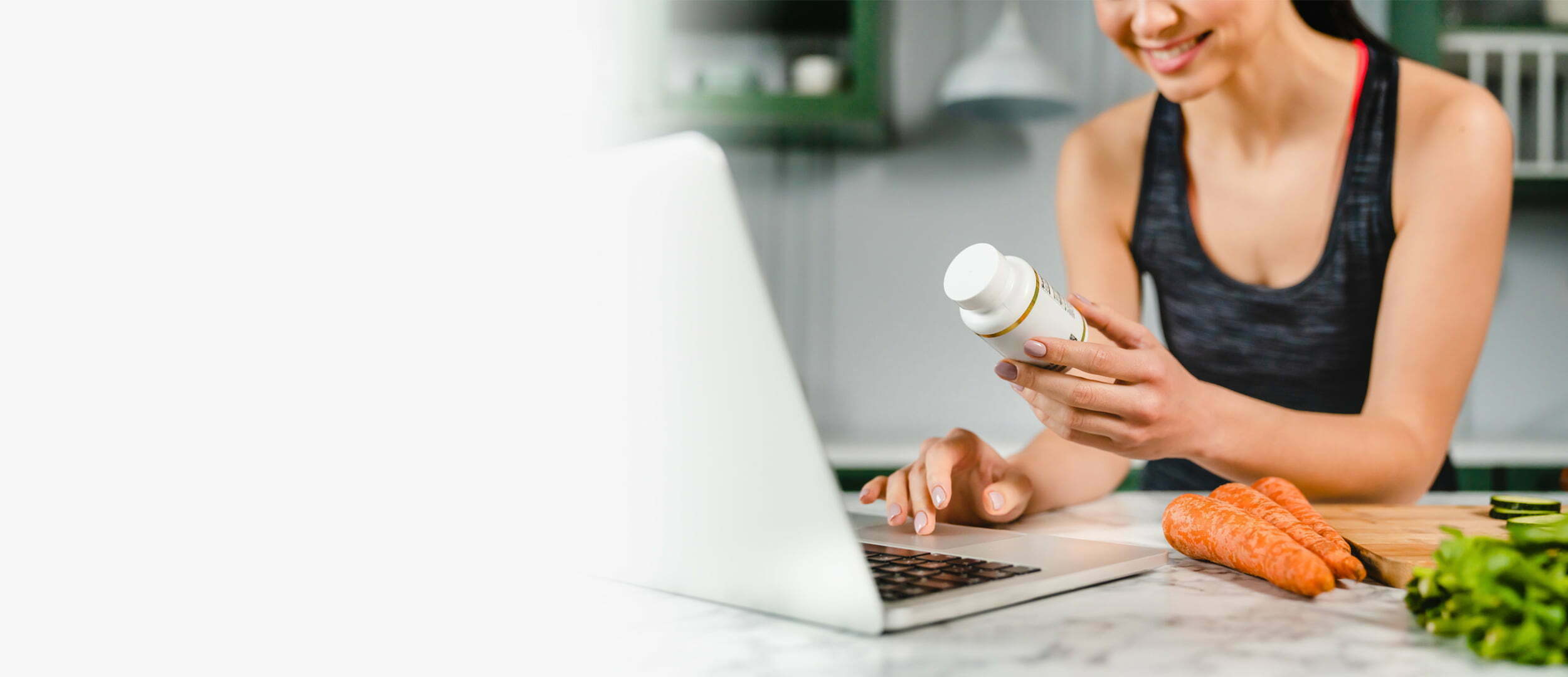 Woman looking at her supplements at e-NutritionStore.com